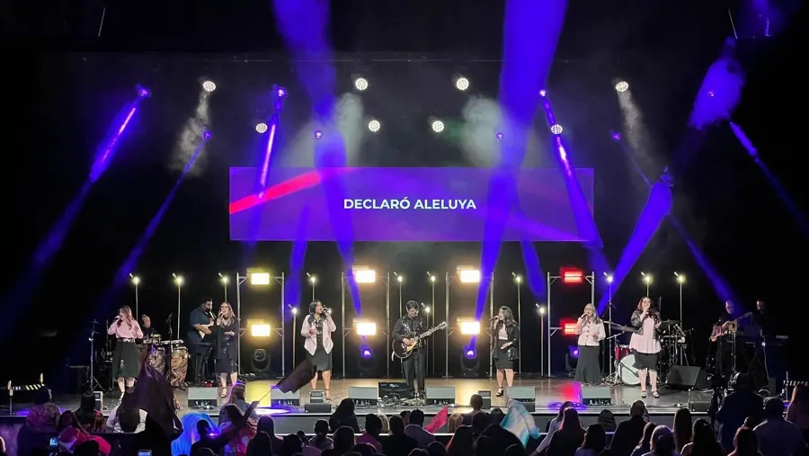 Moving lights and LED fixtures over a concert stage